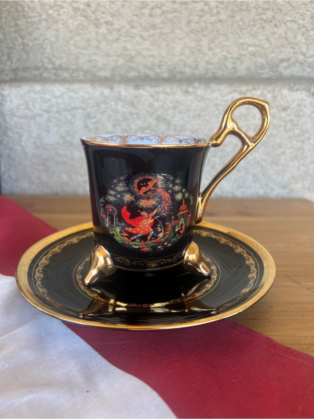 Black and Gold Porcelain Demitasse Cup & Saucer - Ornate Red Detail